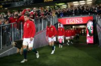British and Irish Lions blindside flanker Sam Warburton leads his team onto the field during the third rugby union Test match between the British and Irish Lions and New Zealand All Blacks at Eden Park in Auckland on July 8, 2017.