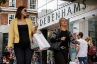 UK department store Debenhams says it will cut about one third of its stores