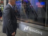 The Nasdaq tumbled as US stocks resumed their downward slide following disappointing earnings announcements from Amazon and Google-parent Alphabet