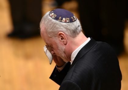 Mourners pack emotional vigil for victims of US synagogue attack