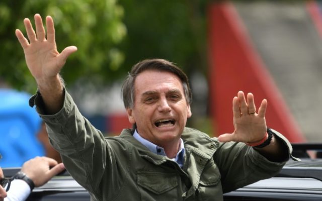 Fireworks and flags as Bolsonaro wins Brazil presidential vote