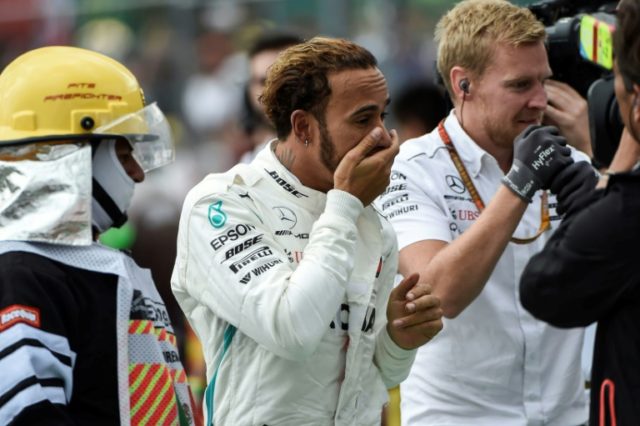 Hamilton joins Fangio with 'surreal' fifth world title