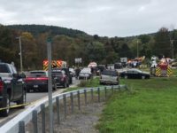 AP source: Tourist-spot crash kills 18 in limo, 2 bystanders