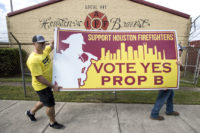 Houston firefighters take battle over pay to voters
