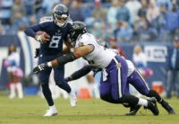 The Latest: Ravens get 6 sacks in first half against Titans