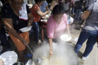 Food, water, ride: Guatemalans aid Honduran caravan migrants