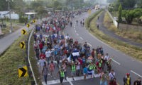 The Latest: Federal police monitoring migrant caravan