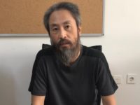 In this image released by the Hatay governorate in Turkey, Jumpei Yasuda of Japan, talks in Antakya, Turkey, Wednesday, Oct. 24, 2018. Japan confirmed Wednesday that a man freed from Syria is the Japanese freelance journalist Yusuda, who was kidnapped three years ago by al Qaida's branch in Syria, known at the time as the Nusra Front, and said he appears to be in good health. (Antakya Governorate via AP) In this image released by the Hatay governorate in Turkey, Jumpei Yasuda of Japan, talks in Antakya, Turkey, Wednesday, Oct. 24, 2018. Japan confirmed Wednesday that a man freed from Syria is the Japanese freelance journalist Yusuda, who was kidnapped three years ago by al-Qaida's branch in Syria, known at …