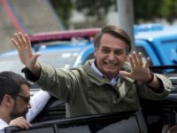 Brazilians weigh change versus risk to democracy in election