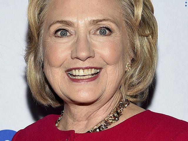 Former First Lady of the United States Hillary Rodham Clinton poses backstage before her c