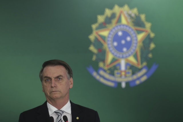 Brazil's President-elect Jair Bolsonaro attends a joint statement with Brazil's president,