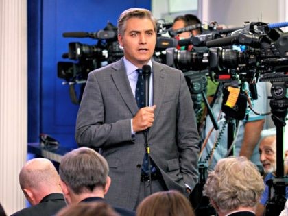 FILE - In this Aug. 2, 2018 file photo, CNN correspondent Jim Acosta does a stand up before the daily press briefing at the White House in Washington. Acosta says President Donald Trump’s attacks on the media must stop or there’s a risk someone will get hurt. He is one …