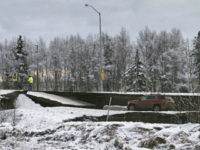 Alaska-earthquake-November-30-2018-ap A car is trapped on a collapsed section of the offramp off of Minnesota Drive in Anchorage, Friday, Nov. 30, 2018. Back-to-back earthquakes measuring 7.0 and 5.8 rocked buildings and buckled roads Friday morning in Anchorage, prompting people to run from their offices or seek shelter under office desks, while …