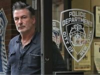 AlecbaldwinNYPD1 Actor Alec Baldwin walks out of the New York Police Department's 10th Precinct, Friday, Nov. 2, 2018, in New York. Baldwin was arrested Friday after allegedly punching a man in the face during a dispute over a parking spot outside his New York City home, authorities said.(AP Photo/Julie Jacobson)
