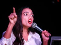 Alexandria-Ocasio-Cortez-wild-pointing-getty Alexandria Ocasio-Cortez addresses the crowd gathered at La Boom night club in Queens on November 6, 2018 in New York City. With her win against Republican Anthony Pappas, Ocasio-Cortez became the youngest woman elected to Congress. (Photo by Rick Loomis/Getty Images)