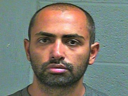 Authorities arrested Amiremad Nayebyazdi, an Oklahoma City man, for allegedly taking suspi