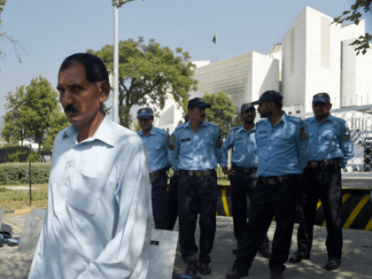 Ashiq Masih,(L), husband of Christian woman Asia Bibi who faces the death sentence for blasphemy, leaves the Supreme Court in Islamabad on October 13, 2016. Pakistan's Supreme Court delayed an appeal into the country's most notorious blasphemy case, against a Christian mother on death row since 2010, after one of …