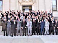 Baraboo HS pre-prom picture in which students appear to perform Nazi salutes