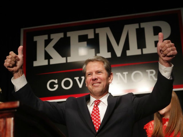 eorgia Republican gubernatorial candidate Brian Kemp gives a thumbs-up to supporters, Wedn