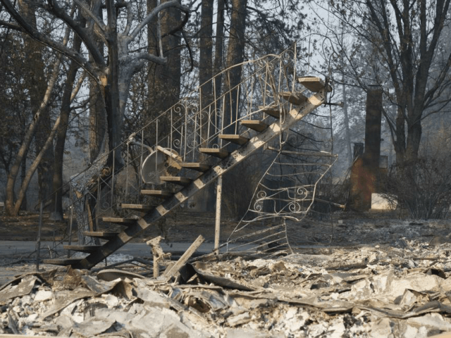 Only a staicase remains of a two story building in Paradise, Calif., on November 17. The Camp Fire, California's worst and deadliest, was declared 100 percent contained Sunday. Photo by Terry Schmitt/UPI