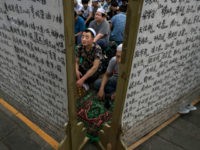 Chinese-men-carpet-before-prayers-wall-getty Chinese Hui Muslim men wait on a carpet before Eid al-Fitr prayers marking the end of the holy fasting month of Ramadan at the historic Niujie Mosque on June 16, 2018 in Beijing, China. Islam in China dates back to the 10th century as the legacy of Arab traders who …
