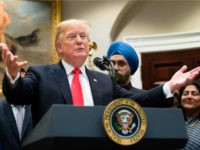 Donald-Trump-Diwali-White-House-getty US President Donald Trump speaks during the Diwali ceremonial lighting of the Diya at the White House in Washington, DC, on November 13, 2018. (Photo by Jim WATSON / AFP) (Photo credit should read JIM WATSON/AFP/Getty Images)