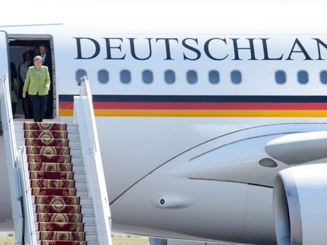 German Chancelor Angela Merkel gets off her plane arrives in Yerevan on August 24, 2018, a