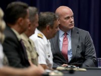 Attorney General Jeff Session Hosts Roundtable With Joint Interagency Task Force In D.C. WASHINGTON, DC - AUGUST 29: Department of Justice Chief of Staff Matt Whitaker (R) participates in a round table event with the Joint Interagency Task Force - South (JIATF-S) foreign liaison officers at the Department of Justice Kennedy building August 29, 2018 in Washington, DC. Based in Key West, Florida, …