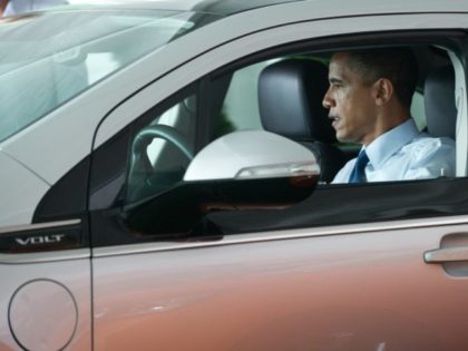 US President Barack Obama sits in an electric Chevrolet Volt following a groundbreaking ceremony for Compact Power's new advanced battery factory in Holland, Michigan, July 15, 2010. The plant will build batteries for electric vehicles including the Chevrolet Volt and Ford Focus. AFP PHOTO / Saul LOEB (Photo credit should …