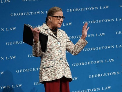 WASHINGTON, DC - SEPTEMBER 26: U.S. Supreme Court Justice Ruth Bader Ginsburg (R) waves to