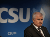 MUNICH, GERMANY - OCTOBER 15: Horst Seehofer, Chairman of the Christian Social Union (CSU), and Markus Soeder (not pictured), Governor of Bavaria and lead candidate of the CSU in yesterday's Bavarian state elections, speak to the media follwoing a meeting of the CSU leadership at party headquarters on October 15, …