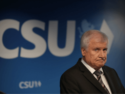 MUNICH, GERMANY - OCTOBER 15: Horst Seehofer, Chairman of the Christian Social Union (CSU), and Markus Soeder (not pictured), Governor of Bavaria and lead candidate of the CSU in yesterday's Bavarian state elections, speak to the media follwoing a meeting of the CSU leadership at party headquarters on October 15, …