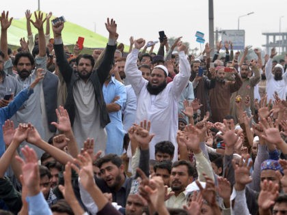 Supporters of the Tehreek-e-Labaik Pakistan (TLP), a hardline religious political party, c