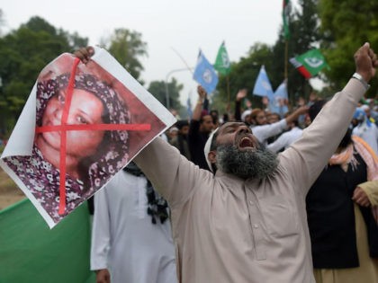 A Pakistani supporter of the Ahle Sunnat Wal Jamaat (ASWJ), a hardline religious party, ho