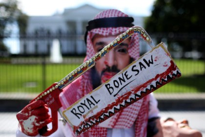 WASHINGTON, DC - OCTOBER 19: A protester dressed as Saudi Arabian crown prince Mohammad bin Salman, demonstrates with members of the group Code Pink outside the White House in the wake of the disappearance of Saudi Arabian journalist Jamal Khashoggi October 19, 2018 in Washington, DC. Khashoggi has disappeared following …