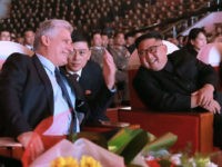 This photo taken on November 4, 2018 and released by North Korea's official Korean Central News Agency (KCNA) on November 5 shows North Korean leader Kim Jong Un (R) and Cuba's President Miguel Diaz-Canel (L) chatting while watching an art performance in Pyongyang. (Photo by KCNA VIA KNS / KCNA …
