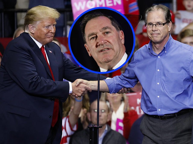 FORT WAYNE, IN - NOVEMBER 05: U.S. President Donald Trump and Republican Senate candidate Mike Braun shake hands during a campaign rally at the County War Memorial Coliseum November 5, 2018 in Fort Wayne, Indiana. Braun is facing first-term Sen. Joe Donnelly (D-IN) in tomorrow's midterm election. Trump is campaigning …