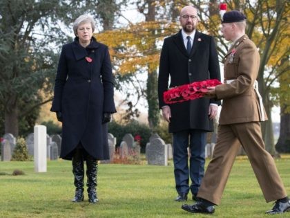 Britain's Prime Minister Theresa May (L) and Belgium's Prime Minister Charles Mi