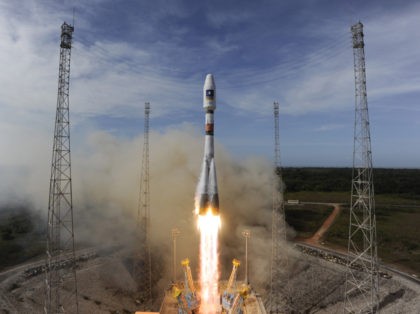 KOUROU, FRENCH GUIANA - OCTOBER 12: In this handout image supplied by the European Space Agency (ESA), the Soyuz rocket lifts off for the third time from Europe's Spaceport in French Guiana on its mission to place the second pair of Galileo In-Orbit Validation satellites into orbit, on October 12, …