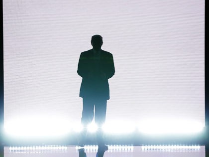 CLEVELAND, OH - JULY 18: Presumptive Republican presidential nominee Donald Trump enters the stage to introduce his wife Melania on the first day of the Republican National Convention on July 18, 2016 at the Quicken Loans Arena in Cleveland, Ohio. An estimated 50,000 people are expected in Cleveland, including hundreds …