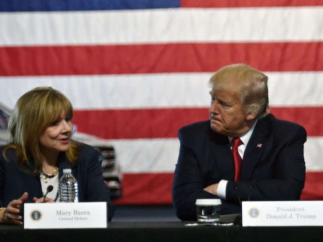 US President Donald Trump speaks at American Center for Mobility in Ypsilanti, Michigan with General Motors CEO Mary Barra on March 15, 2017. / AFP PHOTO / Nicholas Kamm (Photo credit should read NICHOLAS KAMM/AFP/Getty Images)
