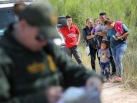 Border Patrol Agents Detain Migrants Near US-Mexico Border MCALLEN, TX - JUNE 12: Central American asylum seekers wait as U.S. Border Patrol agents take groups of them into custody on June 12, 2018 near McAllen, Texas. The families were then sent to a U.S. Customs and Border Protection (CBP) processing center for possible separation. U.S. border authorities are …