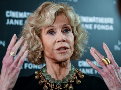 US actress Jane Fonda gestures as she speaks to medias as she attends a retrospective of h