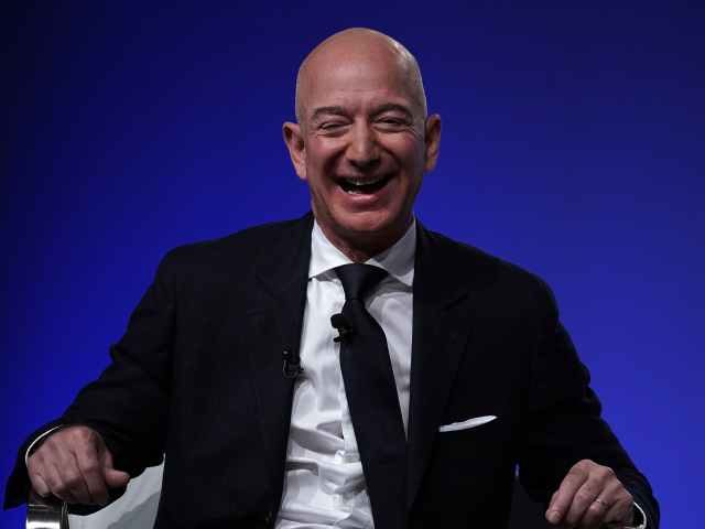 Jeff Bezos of Amazon laughing