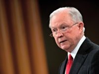 Attorney General Jeff Sessions announces the creation of a new initiative to crack down on Chinese intelligence officials pilfering intellectual property from US corporations through hacking and espionage during a press conference at the Justice Department in Washington, DC, on November 1, 2018. - US Attorney General Jeff Sessions announced …