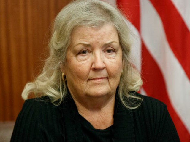 Juanita Broaddrick listens during a meeting with Republican presidential candidate Donald