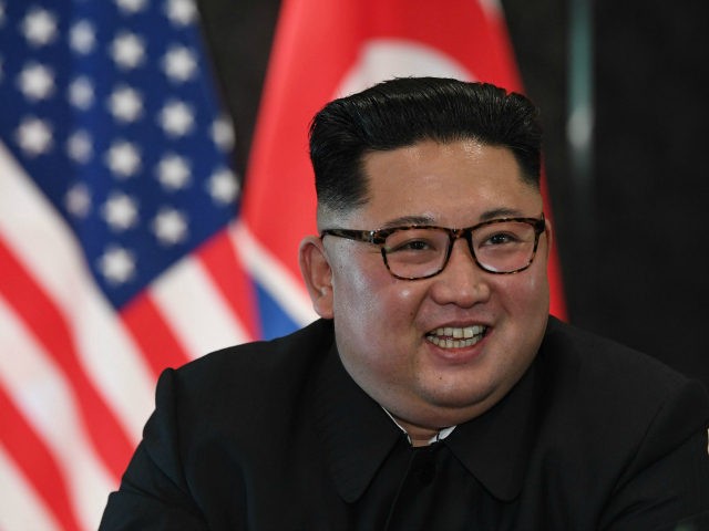 North Korea's leader Kim Jong Un reacts at a signing ceremony with US President Donald Trump (not pictured) during their historic US-North Korea summit, at the Capella Hotel on Sentosa island in Singapore on June 12, 2018. - Donald Trump and Kim Jong Un became on June 12 the first …