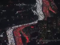 Footage shared to social media shows thousands of commuters sitting in gridlock traffic on Los Angeles's 405 Freeway ahead of Thanksgiving Day.