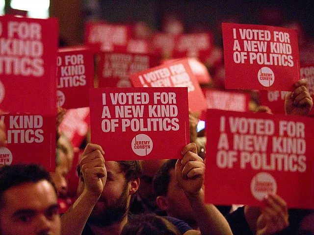 LONDON, ENGLAND - SEPTEMBER 10: Supporters of Jeremy Corbyn, MP for Islington North and candidate in the Labour Party leadership election, listen to speaches at Rock Tower on September 10, 2015 in London, England. Voting closed in the Labour Party leadership contest with the results of which due to be …