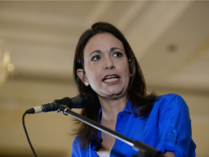 Venezuelan opposition leader Maria Corina Machado speaks during a press conference in Caracas on July 15, 2015. Former lawmaker Machado, who was expelled from the National Assembly in March 2014 and faces charges of conspiring against the government, said yesterday that the comptrollers office informed her, without much explanation, that …